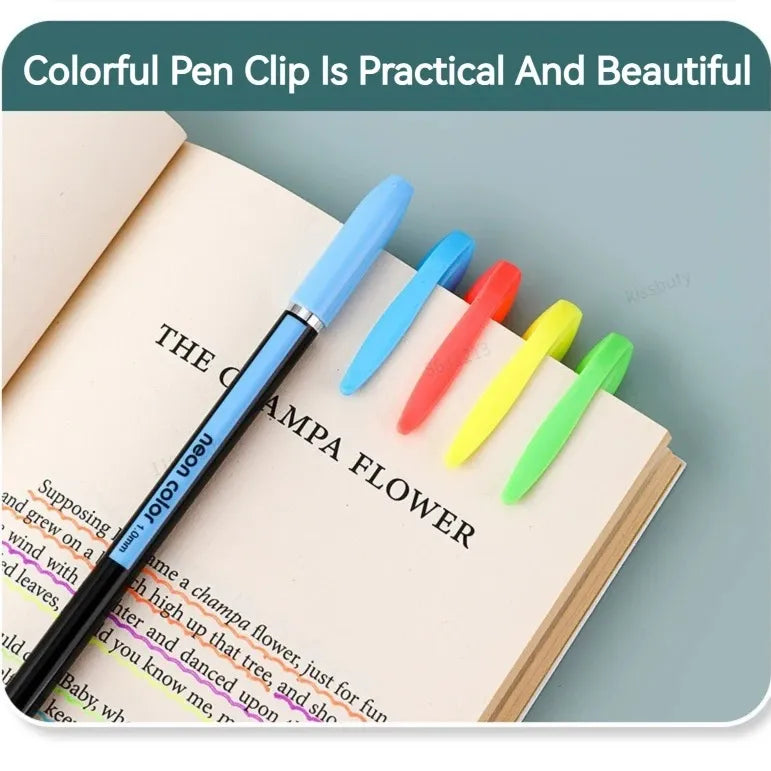 Colorful pen clips on an open book with a blue pen.
