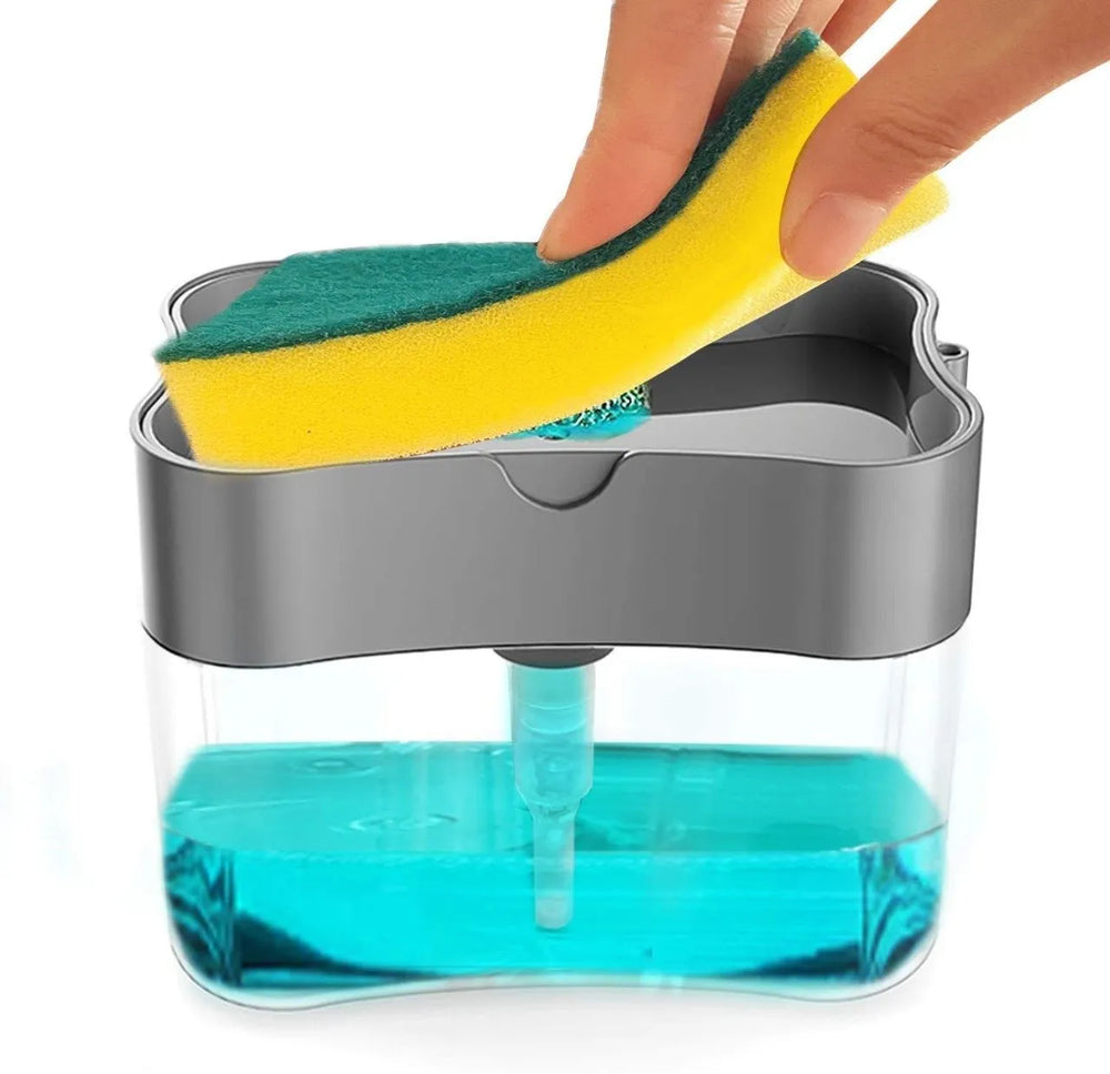 Gray sponge holder with a yellow and green sponge and blue liquid inside, on a white background.