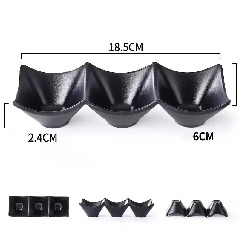 Three black ceramic bowls arranged in a row on a white background, with measurement lines and labels showing 18.5 cm width, 2.