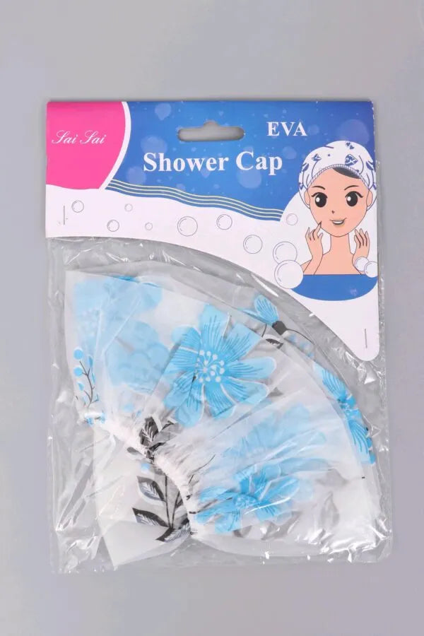 Shower cap with floral design in packaging on a gray background