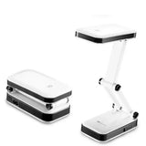 White and black desk lamp with compact design on a white background