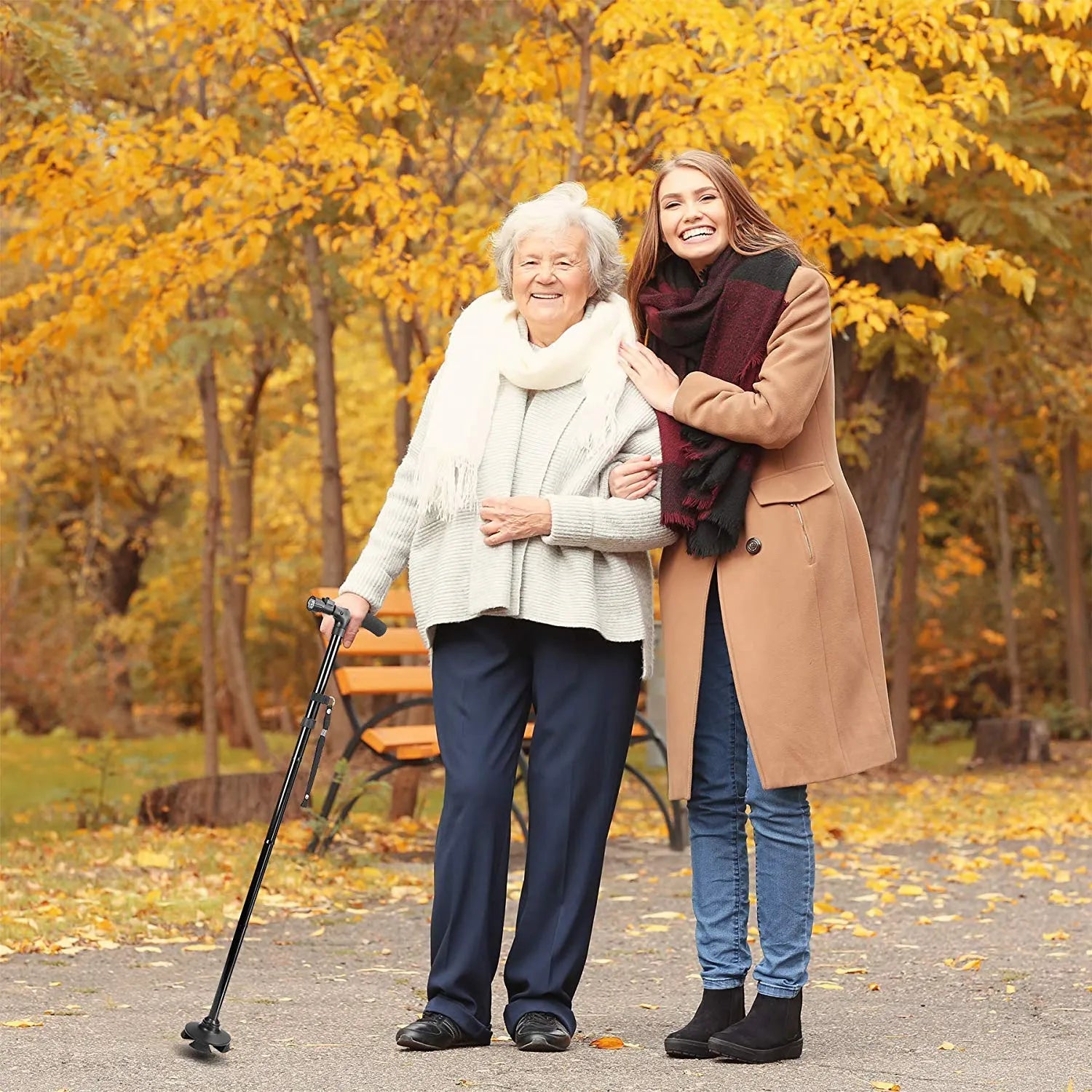 Folding aluminum walking stick with LED light for enhanced stability and visibility.