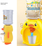 Yellow duck-shaped water dispenser with a cup on a white background