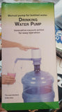 Hand press water dispenser pump designed for simple and hygienic drinking water access.