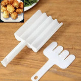 White plastic mold on a wooden surface with a close-up inset of fried food.