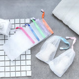 Mesh soap saver pouch designed to hold soap bars and help them dry between uses.