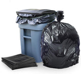 Black trash bags with a blue trash bin on a white background