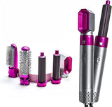 Hair styling tool with interchangeable attachments on a white background