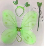 A green fairy costume accessory set on a white background, including a large translucent butterfly wing piece with glittery green veins and a butterfly center, a green headband with butterfly decorations, and a green wand with a butterfly topper.