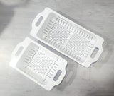 Kitchen dish drainer rack with a durable plastic design for neat and organized dish drying.