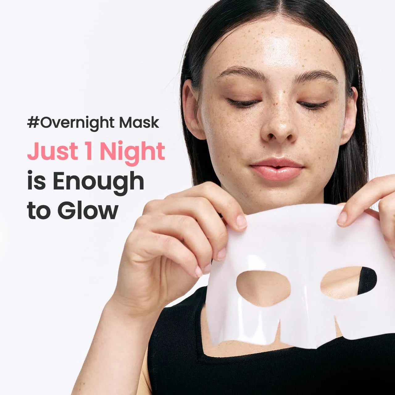 Woman holding a facial mask with text 'Overnight Mask Just 1 Night is Enough to Glow' on a white background