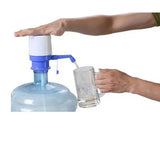 Manual water bottle pump dispenser for convenient use with large water bottles at home and office.