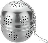 Stainless steel tea ball with chain on a white background