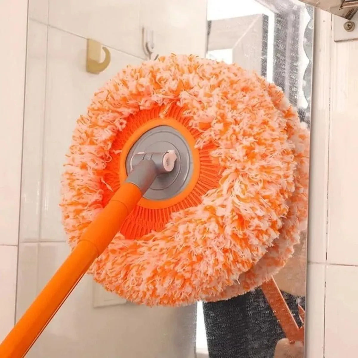 Microfiber cleaning mop with a flexible rotating design for kitchens, floors, and household surfaces.