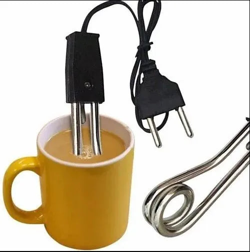 Electric heating element being used to heat a yellow mug of liquid.
