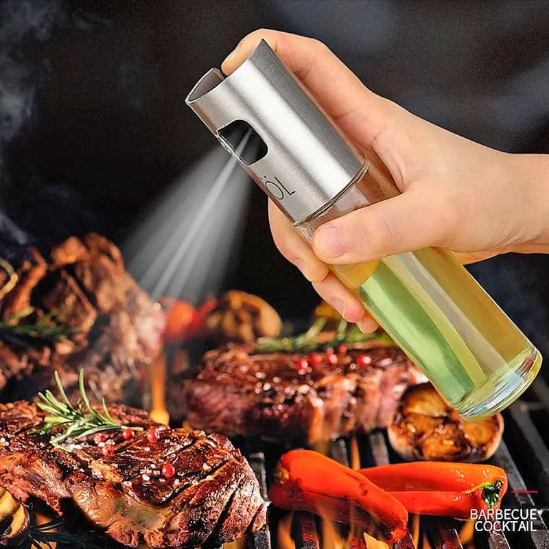 Kitchen oil spray bottle with a glass container for convenient and mess-free cooking use.