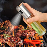 Kitchen oil spray bottle with a glass container for convenient and mess-free cooking use.