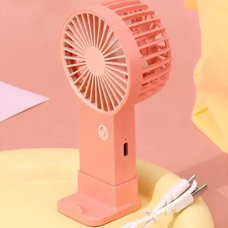 Mini rechargeable handheld fan with a compact design for convenient everyday cooling.