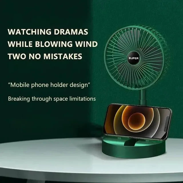 Green fan with phone holder on a white surface against a green background