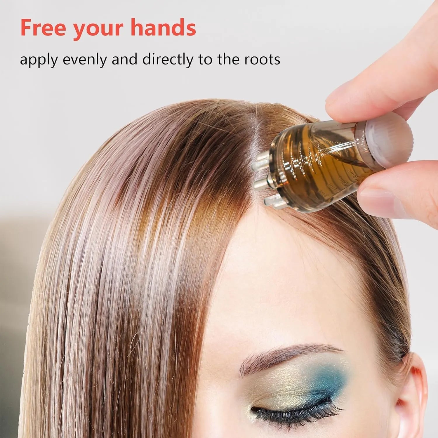 Person applying a hair product to their hair with text on a neutral background