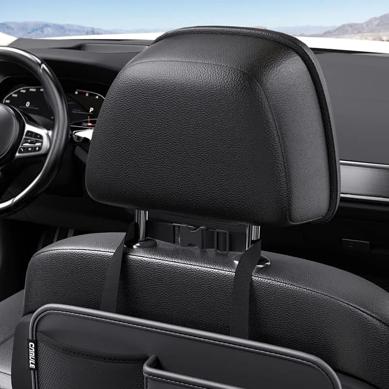 Car headrest organizer with cup holder attached inside a vehicle