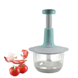 Turquoise kitchen chopper with tomatoes on a white background