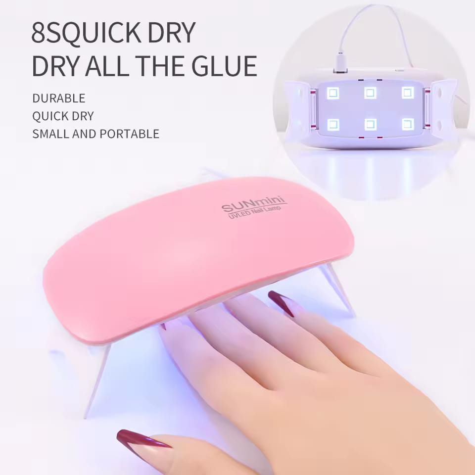 Pink nail dryer with text '8SQUICK DRY DRY ALL THE GLUE'