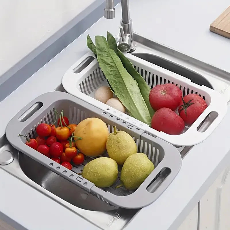 Plastic sink drying rack designed for efficient draining of plates, bowls, cups, and cutlery.