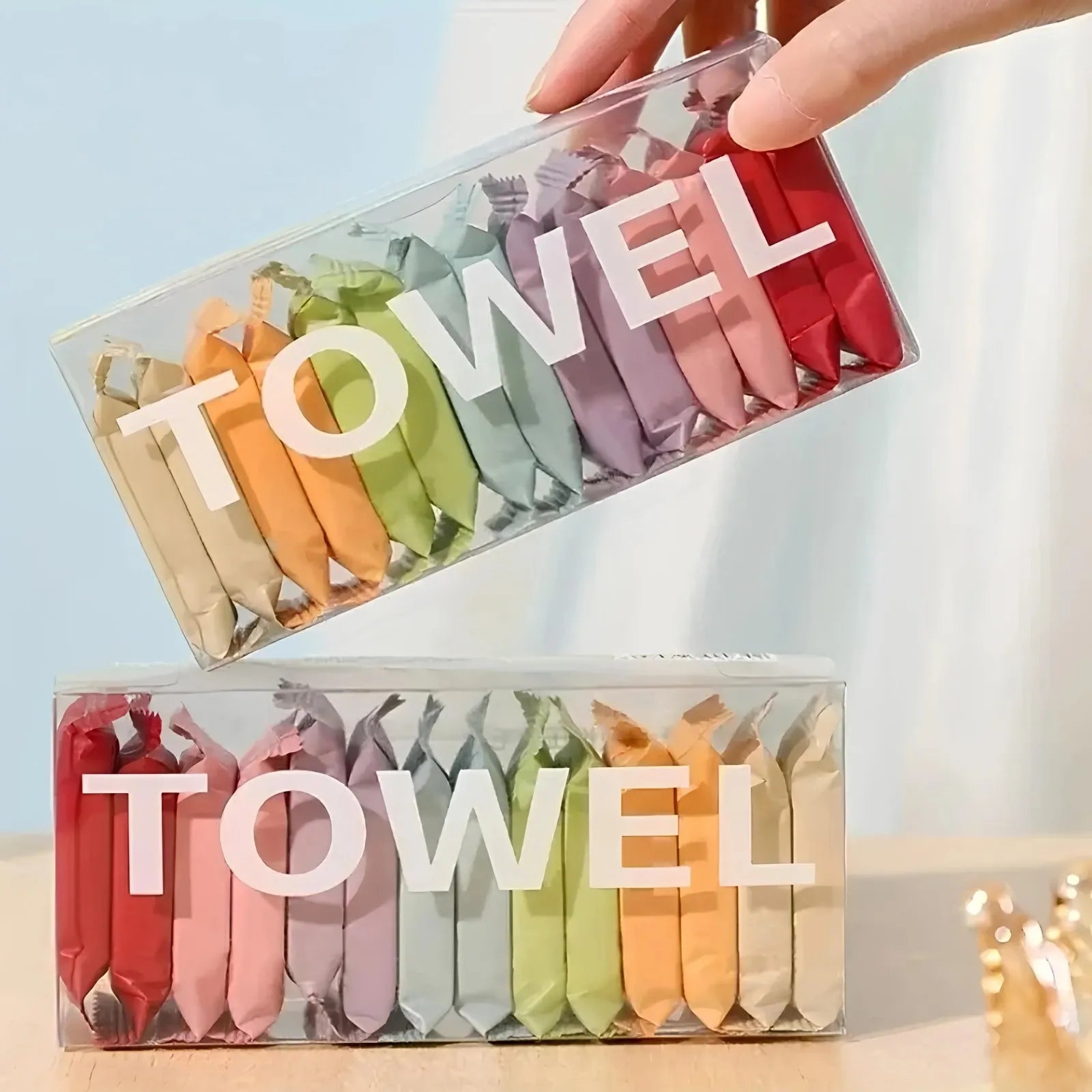 Portable compressed washcloth set with 14 disposable towels for convenient on-the-go cleaning.