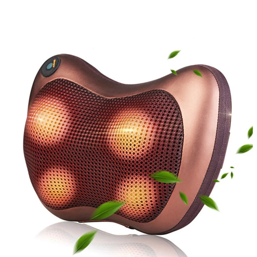 Copper-colored massage pillow with green leaves on a white background