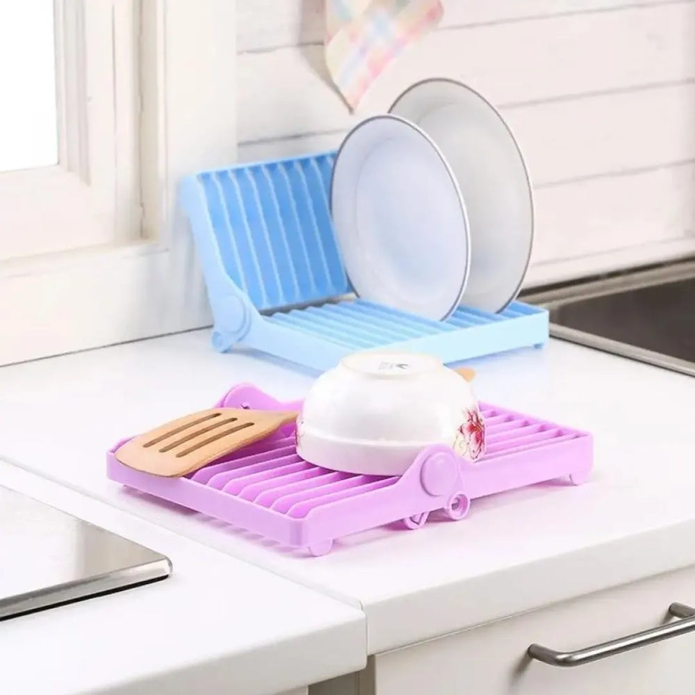 Portable kitchen drying rack with a foldable design for convenient storage and everyday use.