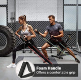 Two people using resistance bands with a focus on the foam handle feature.