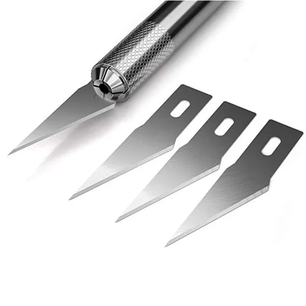 Stainless steel craft knife with interchangeable blades on a white background