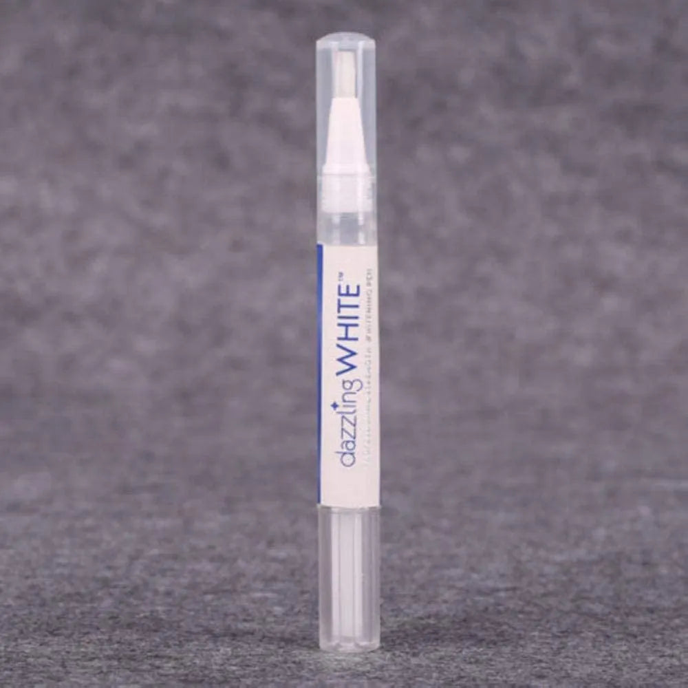 Dazzling White teeth whitening pen on a gray textured background