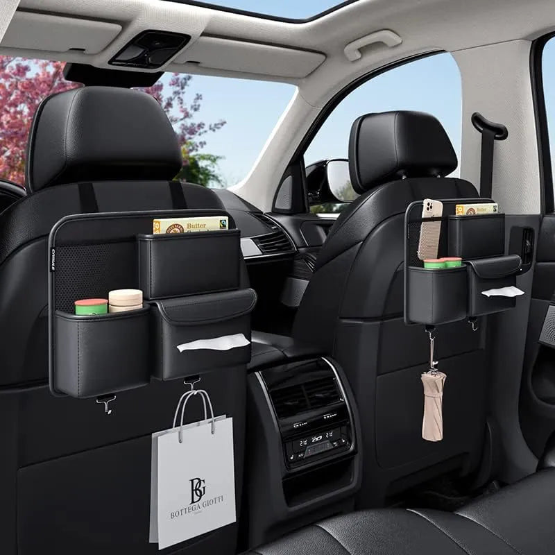 Car back seat organizer with multiple compartments and a phone holder, placed inside a vehicle.