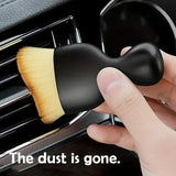 Premium soft-bristle car interior cleaning brush for removing dust from dashboards, vents, and trims.