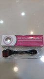 A derma roller tool in its clear plastic blister packaging with a pink and white box behind it, placed on a light-colored surface.