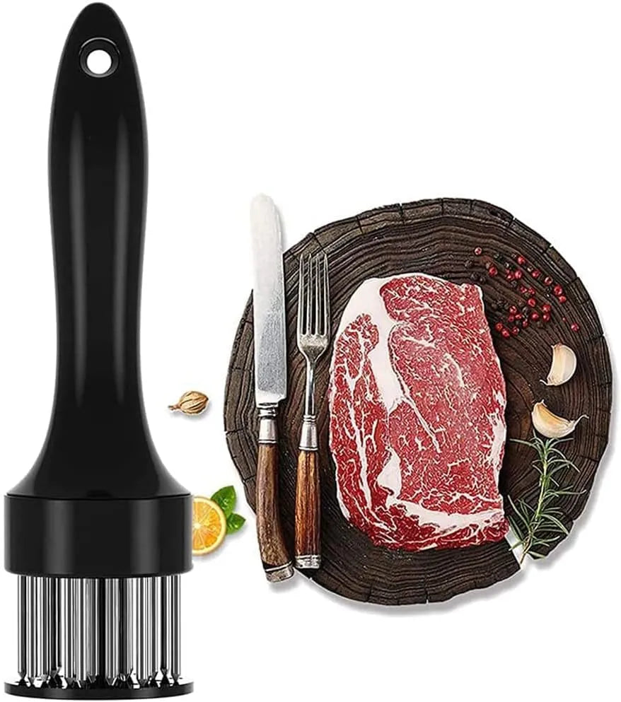 Meat tenderizer on the left with a steak on a wooden board with cutlery and spices on the right.