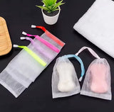 Reusable mesh soap saver drain pouch for storing soap while promoting quick drainage and drying.