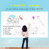 A child stands in front of a large white drawing board on a light blue wall, writing and drawing with crayons. The board has sample drawings and text including 'A Board for Learning' and bullet points about environmental benefits.