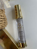 Eamelle skincare serum bottle with gold cap on a white background