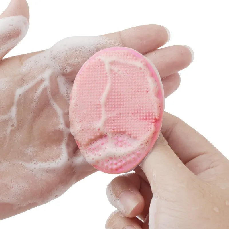 Silicone face cleansing brush pad designed to remove dirt, oil, and makeup residue effectively.