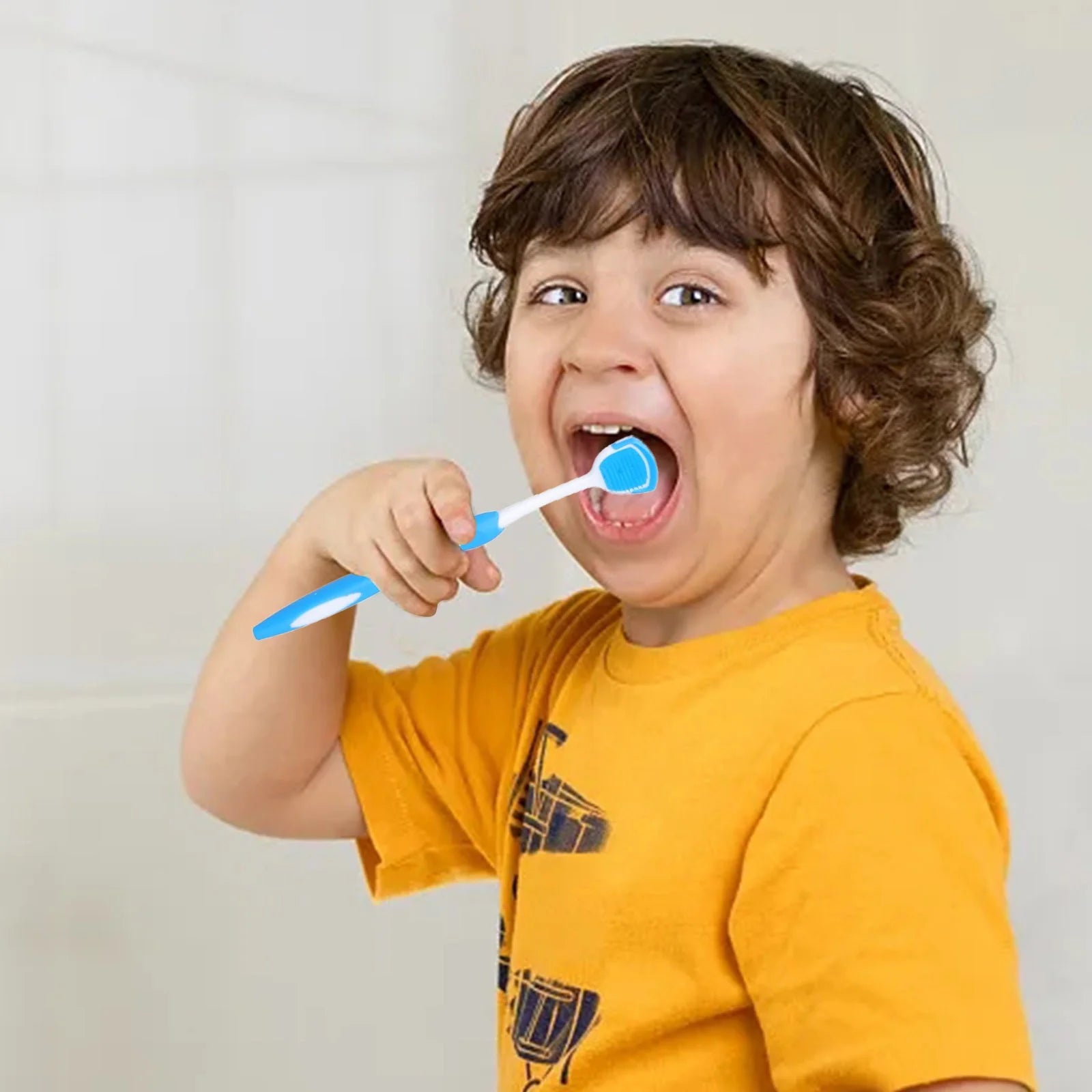 Silicone tongue cleaner and scraper with soft bristles for gentle and thorough oral hygiene.
