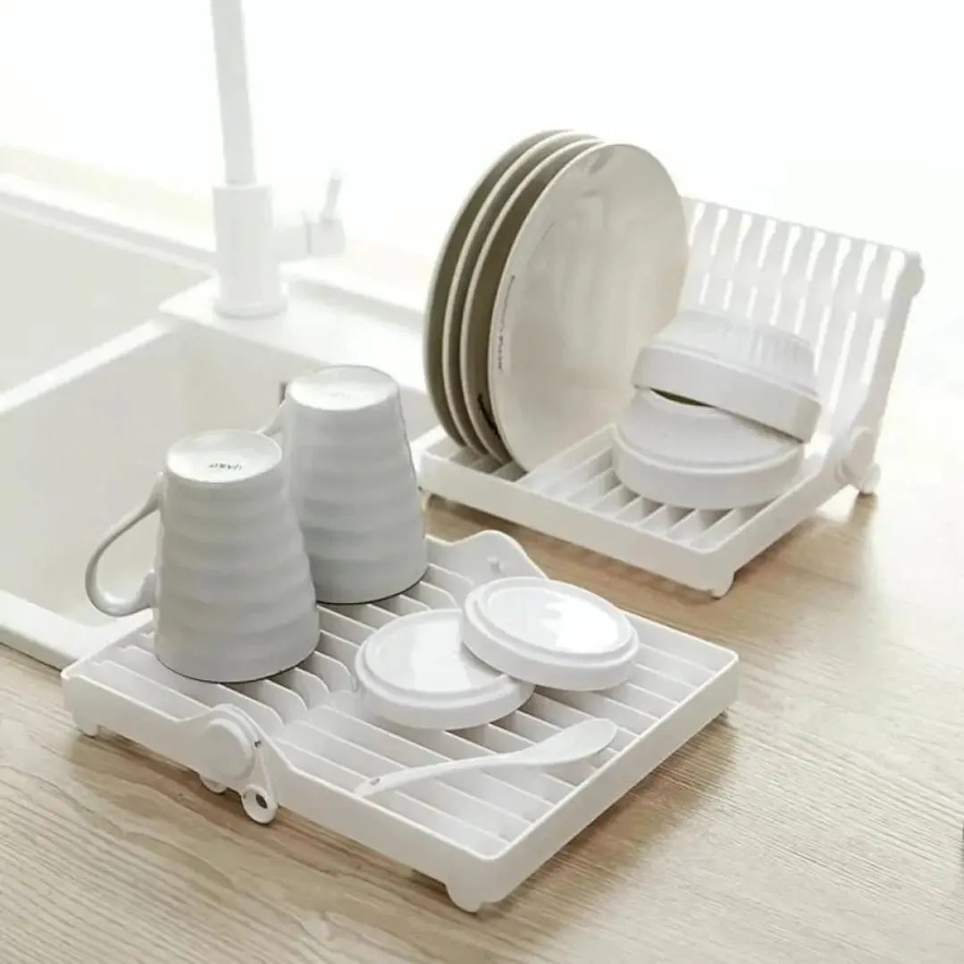 Small foldable kitchen dish drying rack for compact and efficient dish organization.