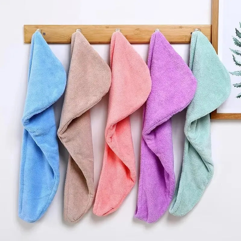 Soft absorbent hair wrap towel for women, ideal for use after showers, baths, and hair washing.