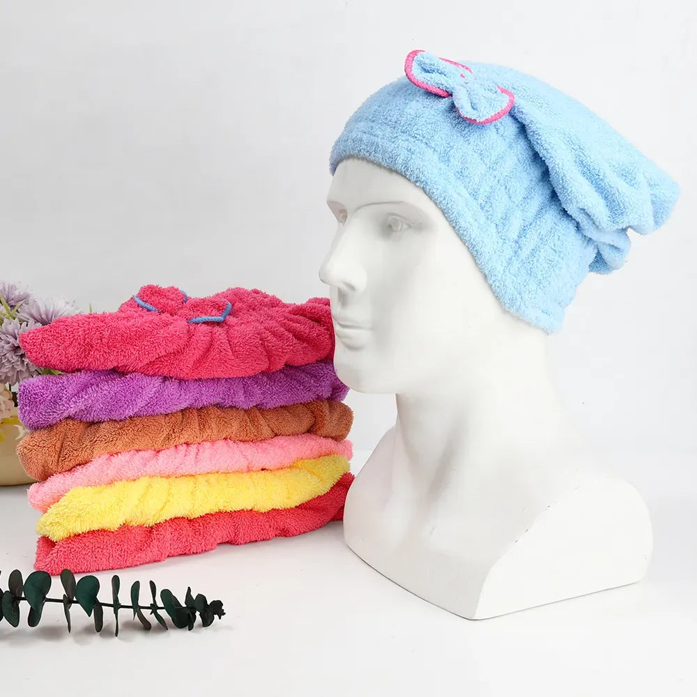 Soft hair drying turban cap made from microfiber with a stylish bow design.