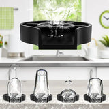 Black ice cube maker with clear ice cubes on a kitchen counter.