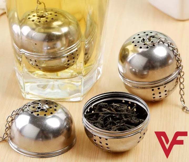 Stainless steel tea ball infuser strainer for brewing loose leaf tea with ease.