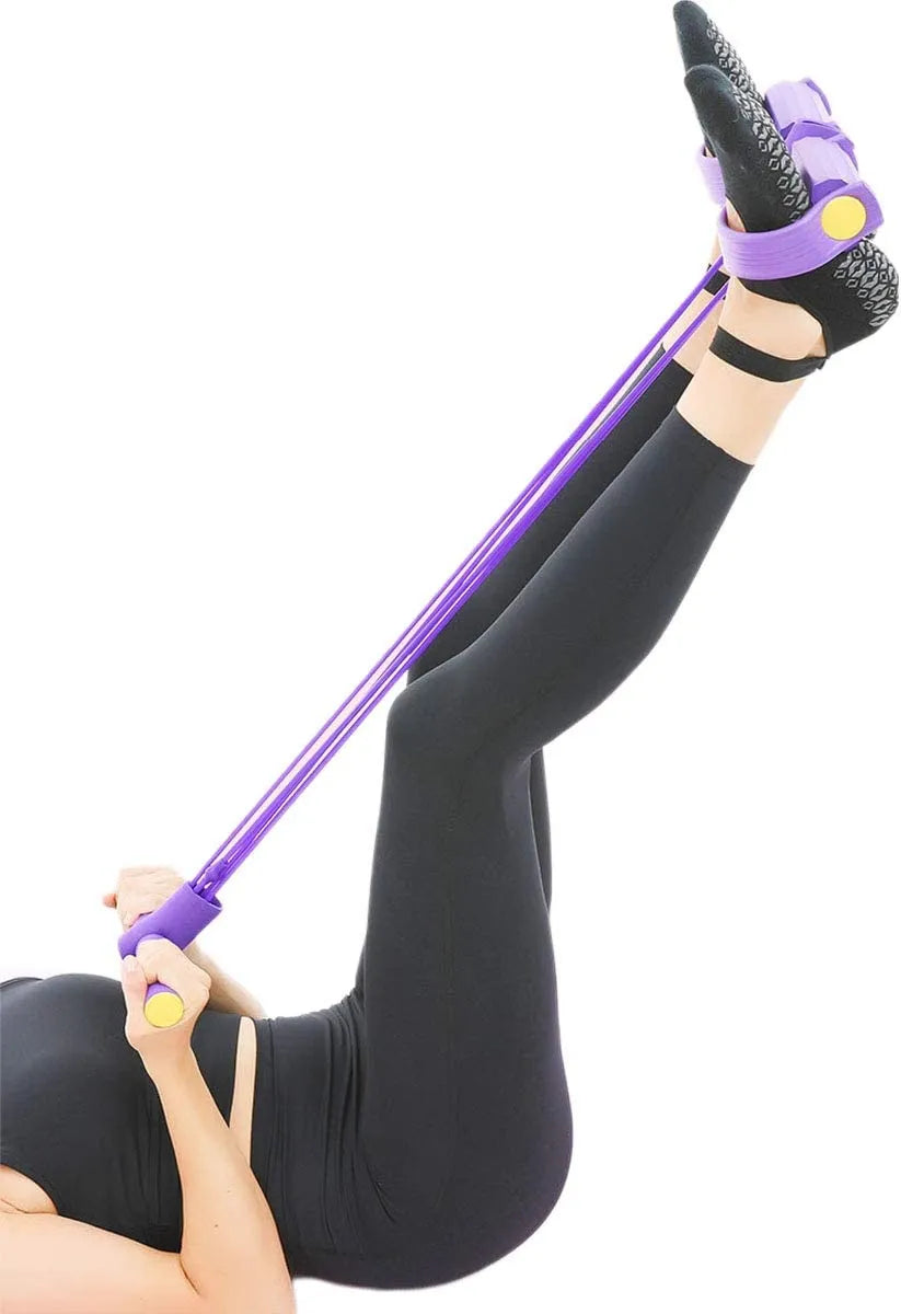 Person using a purple resistance band for leg exercise on a white background