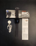 Smartwatch with packaging and manual on a dark surface